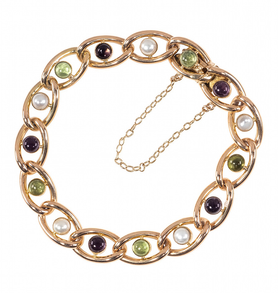 Ein antiques It-Piece | Das edwardianische Suffragettenarmband (um 1910) besteht aus 15 Karat Gold (625), Peridots, Perlen und Amethysten in den Farben grün, weiß und violett. | www.antique-jewellery.de | Foto: © Rheinfrank & Holzfuss OHG